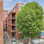 Современный фасад элитного офисного комплекса Cask Works на Stour Road в Hackney Wick, инвестиционный объект с высоким потенциалом роста